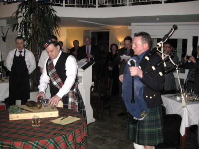 Daniel Beales performing the age old address to the haggis!